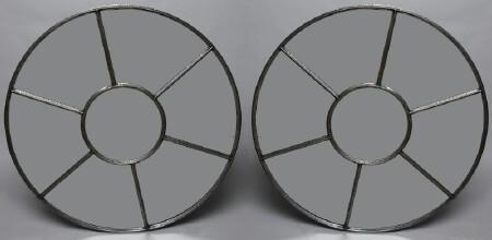 Appraisal: PAIR OF CAST IRON PORTAL FRAMES ADAPTED AS MIRRORS in