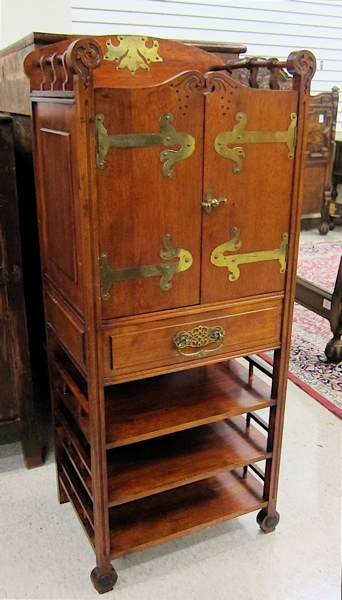 Appraisal: CRAFTSMAN MUSIC CABINET c featuring a -door cabinet over single