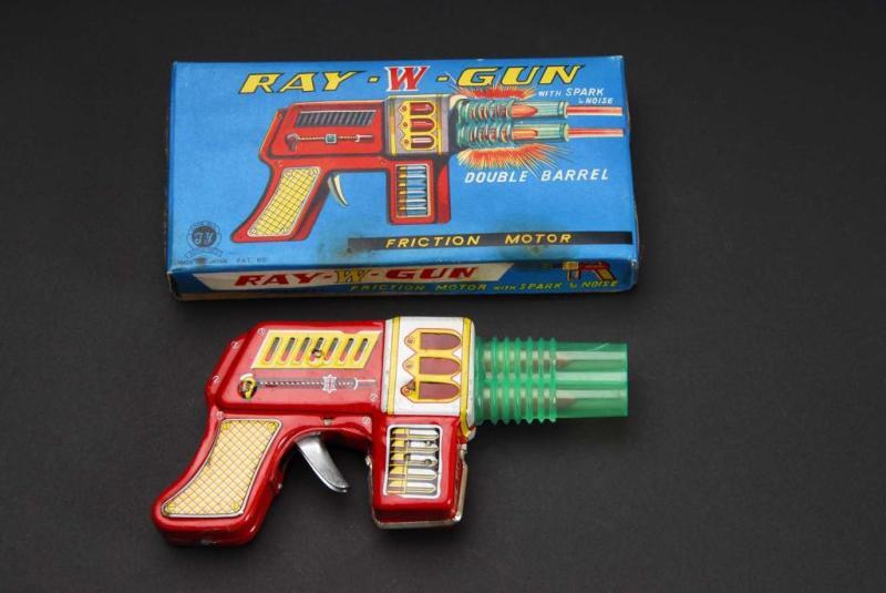 Appraisal: Tin Ray-W-Gun Friction Toy Description Japanese Made by TY Company