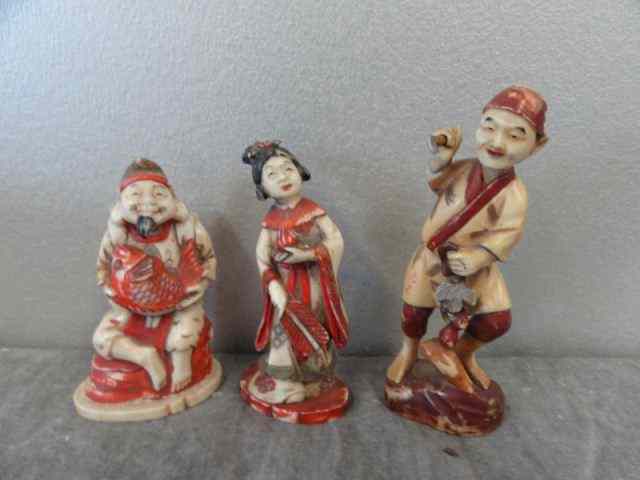 Appraisal: Asian Ivory Figures All are dyed with red and measuring