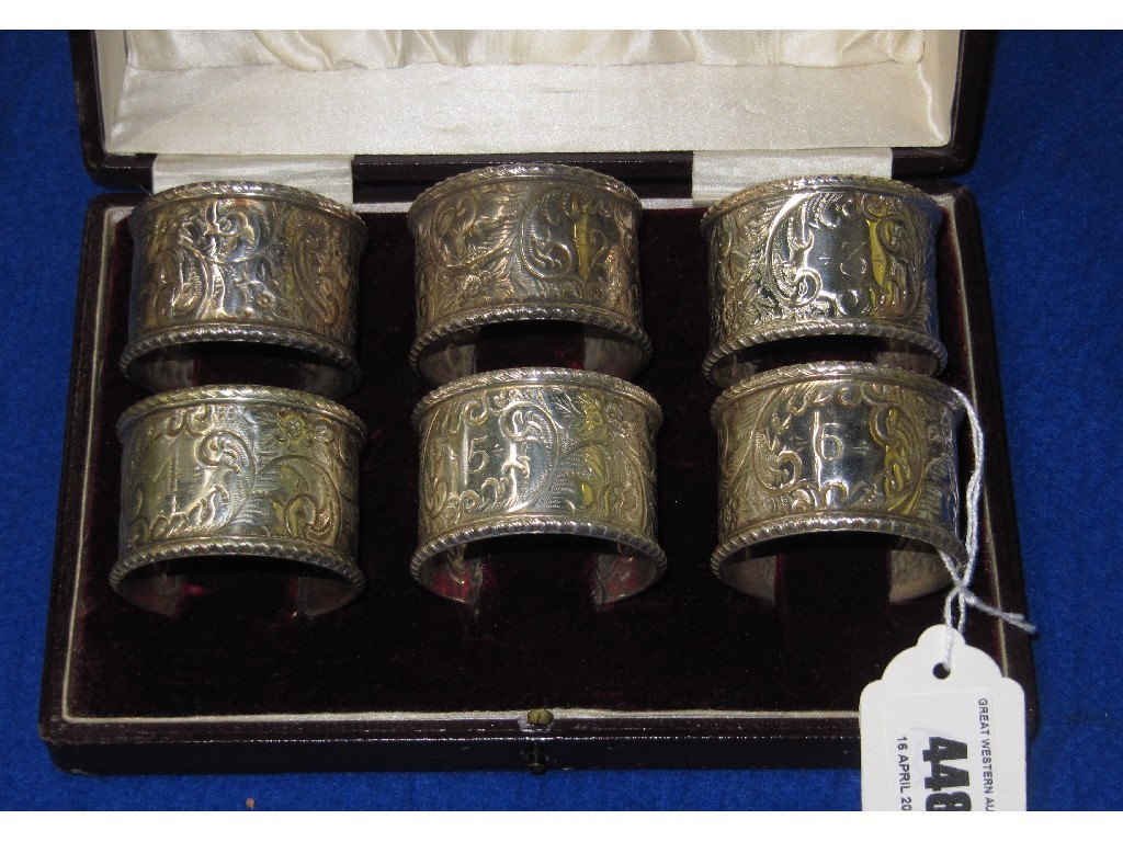 Appraisal: Cased set of six silver plated napkin rings numbered