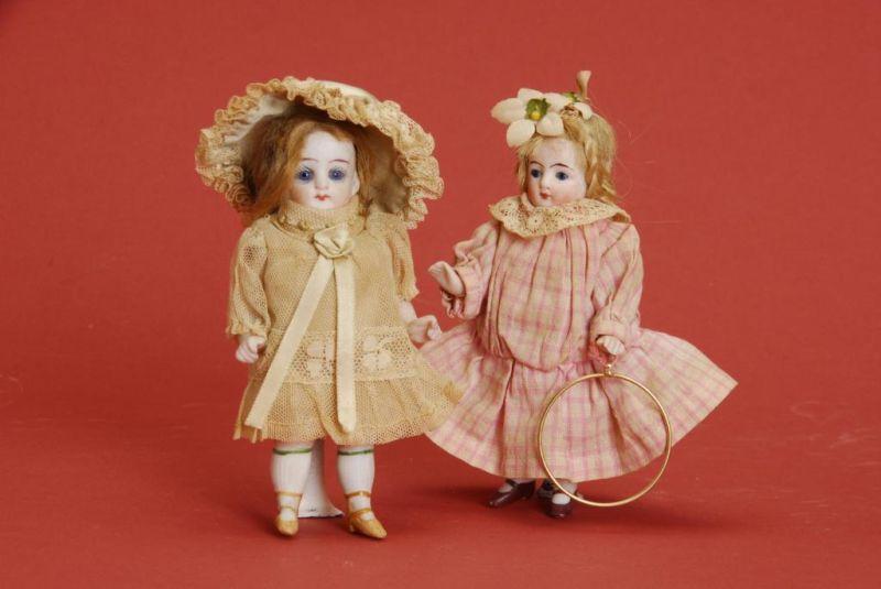 Appraisal: Pair of All Bisque Dolls Germany ca both dolls have