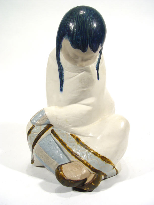 Appraisal: Large Lladro porcelain figure of a Inuit wrapped in a