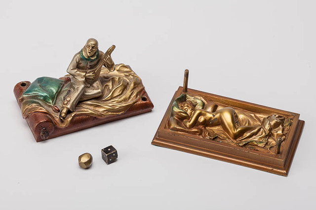 Appraisal: A TH CENTURY COLD PAINTED BRONZE of a reclining musician