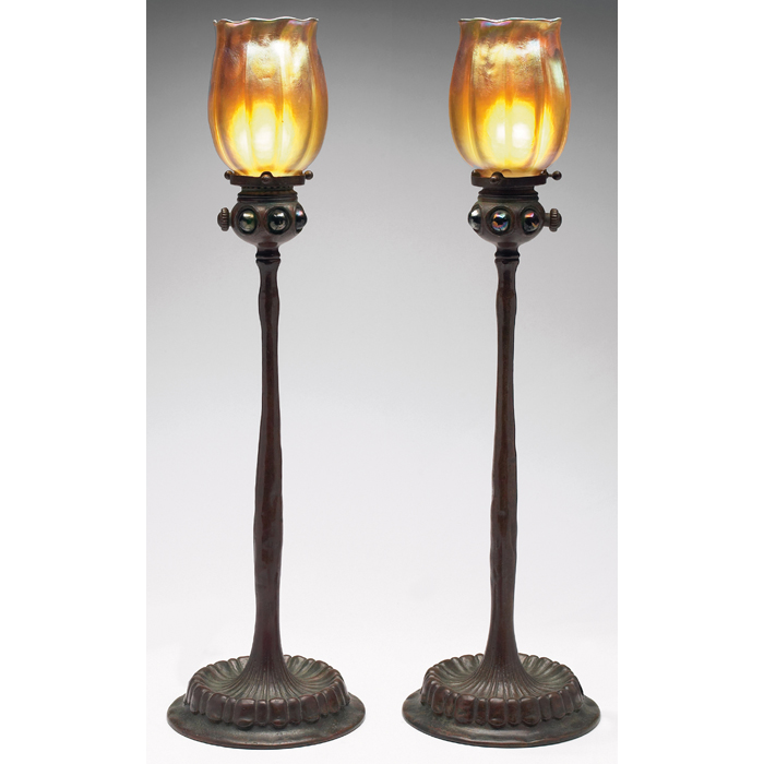 Appraisal: Exceptional Tiffany Studios lamps pair sculpted bronze stick base with