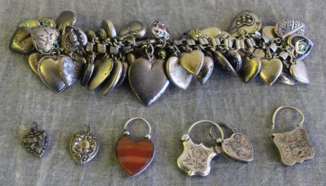 Appraisal: JEWELRY Silver Puffy Heart Charm Bracelet Most charms marked sterling