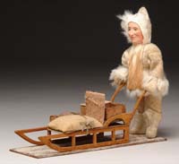 Appraisal: ESKIMO PUSHING SLED Of unknown vintage it depicts standing Eskimo