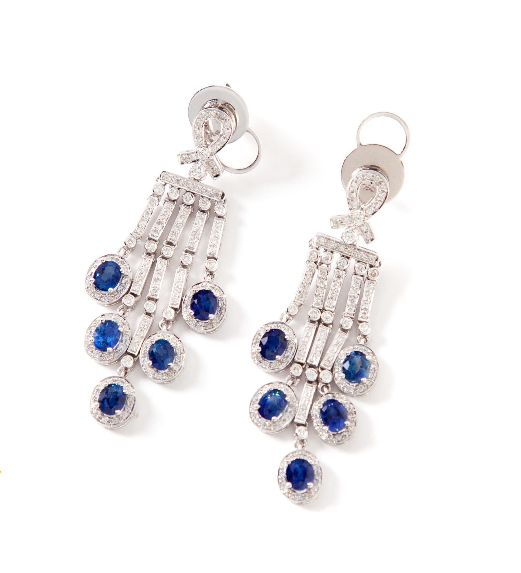 Appraisal: ART DECO-STYLE DIAMOND AND SAPPHIRE EARRINGS American st century KWG