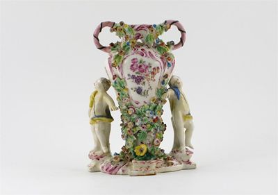 Appraisal: A Bow vase between two putti painted with flower sprays