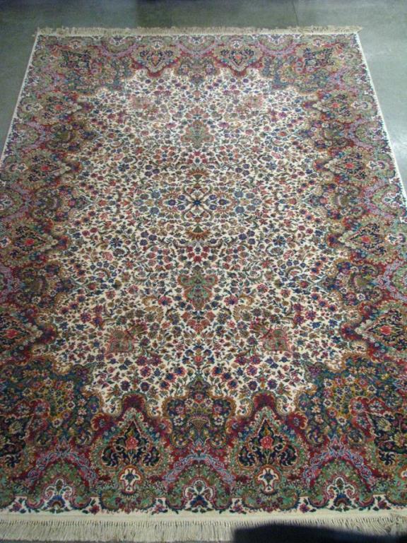 Appraisal: A room size Karastan rug Floral Kirman pattern ' x