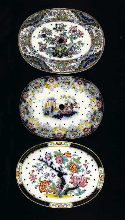 Appraisal: A STAFFORDSHIRE EARTHENWARE CLEOPATRA PATTERN DRAINER AND TWO OTHERS transfer