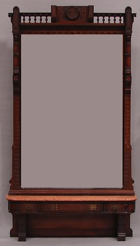 Appraisal: Mirror frame with carved flowerheads and chevrons gallery of small