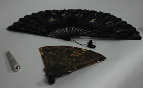 Appraisal: A Japanese faux tortoiseshell and gilt lacquered fan opening to