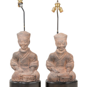 Appraisal: A Pair of Chinese Terra Cotta Figural Lamps th Century