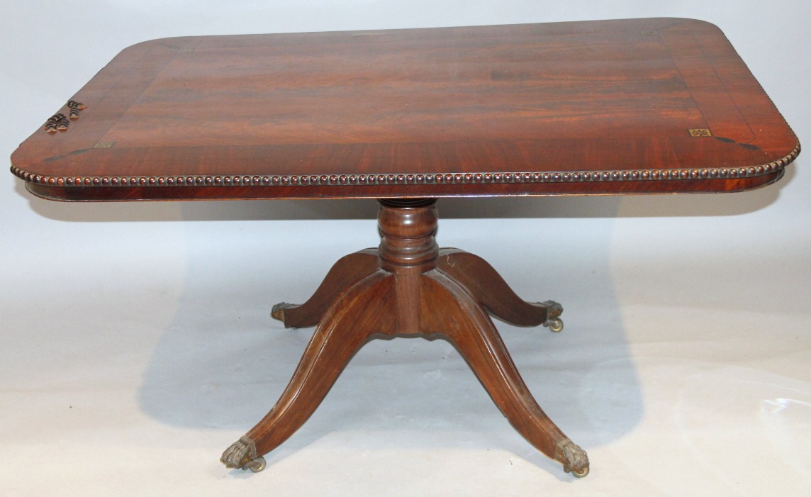 Appraisal: A Regency flame mahogany ebonised and metal inlaid supper table