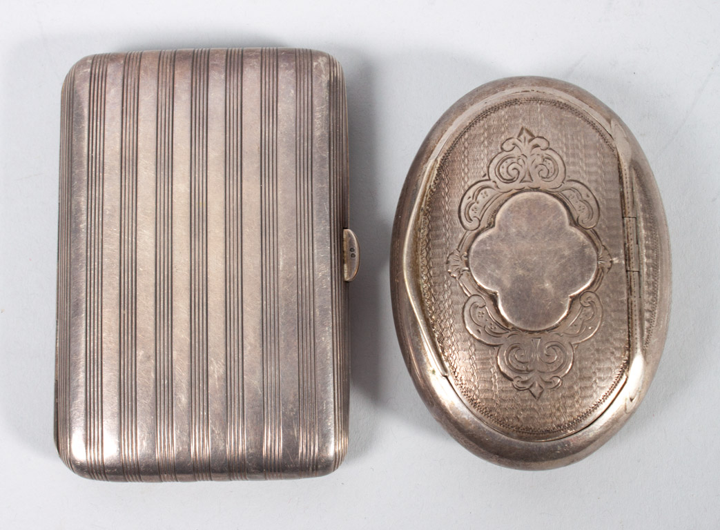 Appraisal: Two Austrian silver boxes comprising a machine-engraved oval tobacco box