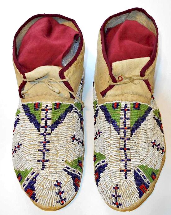 Appraisal: Lakota Sioux Fully Beaded Moccasins th C The lot features