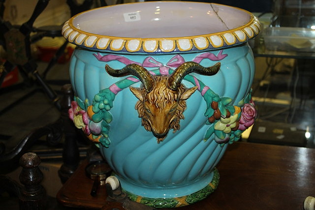 Appraisal: A MINTON MAJOLICA JARDINIERE with polychrome floral swag decoration on