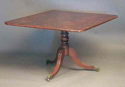 Appraisal: A George III mahogany rectangular breakfast table the top crossbanded