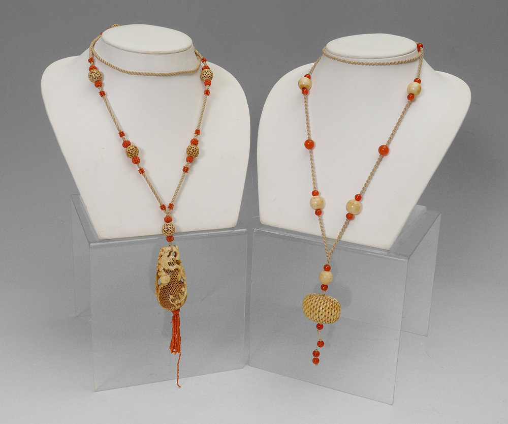 Appraisal: CHINESE ''CRICKET CAGE'' BONE AND GLASS NECKLACES Coral beads and