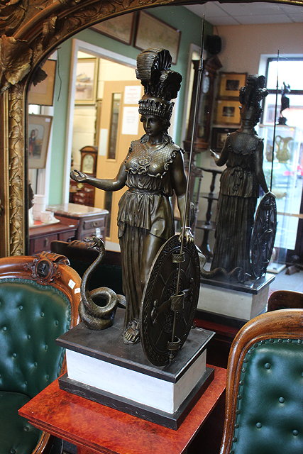 Appraisal: A CONTEMPORARY BRONZE SCULPTURE OF A ROMAN GODDESS ATHENA wearing