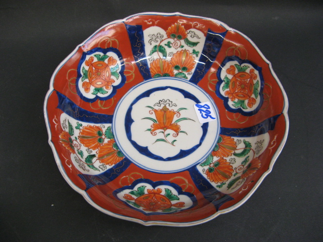 Appraisal: JAPANESE IMARI PORCELAIN CENTER BOWL hand painted with panels of