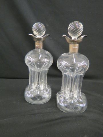 Appraisal: Sterling Crystal Decanters English hallmarked collars pinch style excellent