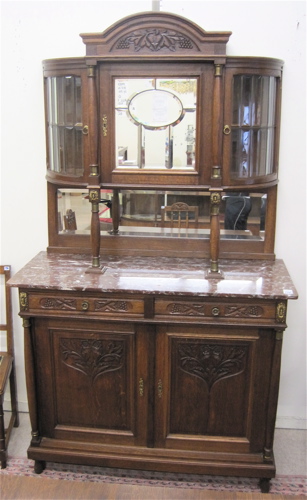 Appraisal: A CARVED OAK SIDEBOARD IN TWO SECTIONS Belgian c The