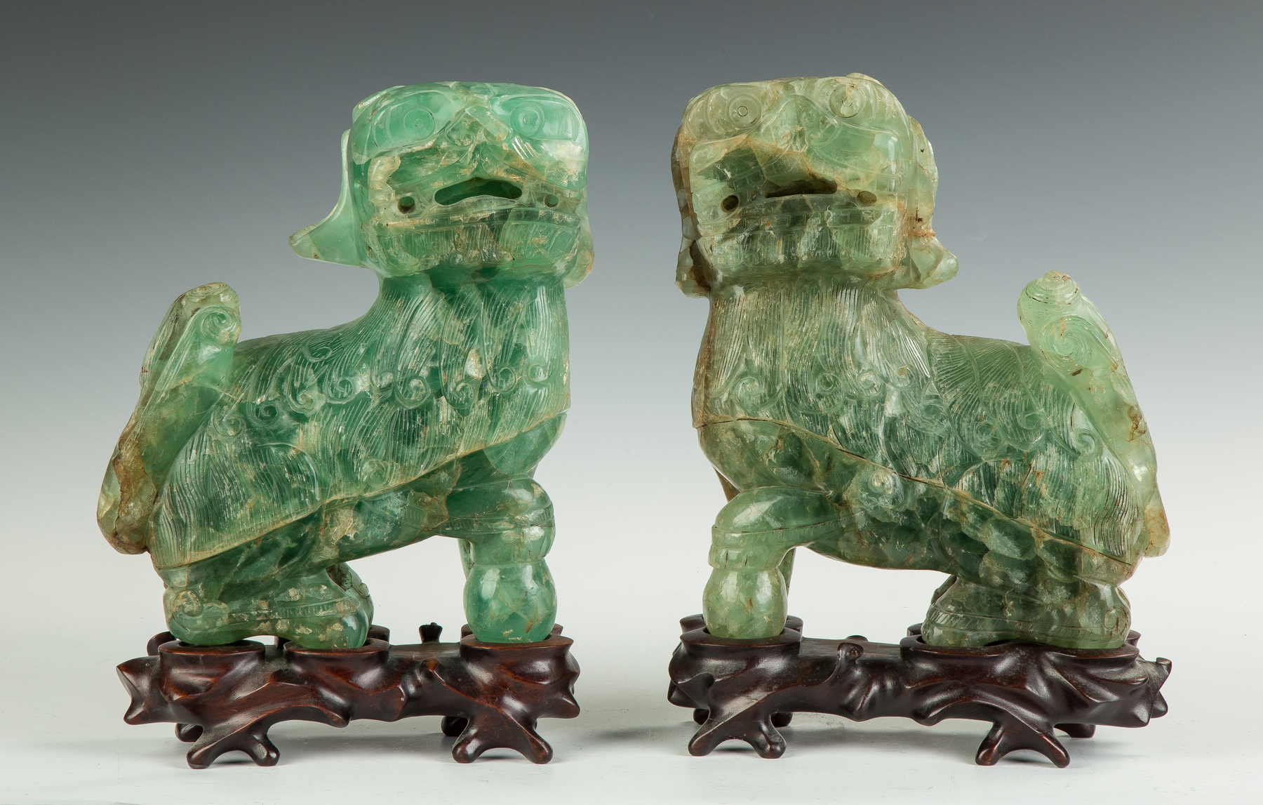 Appraisal: Pair of Bowenite Foo Dogs Late th early th century