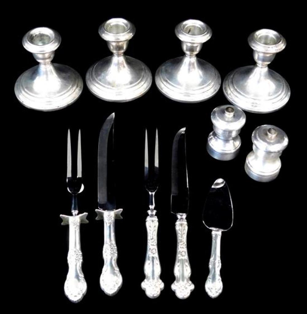 Appraisal: STERLING Eleven serving pieces all weighted or with stainless steel