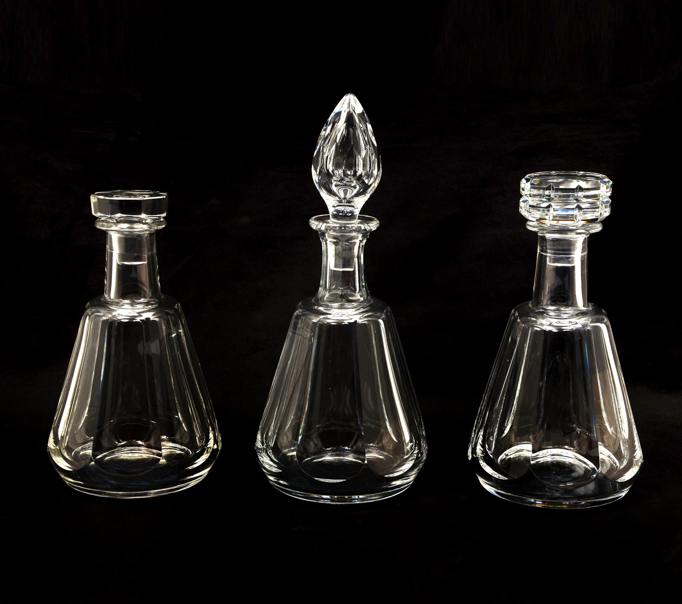 Appraisal: BACCARAT CRYSTAL DECANTERS - Waterford crystal decanters having paneled bodies