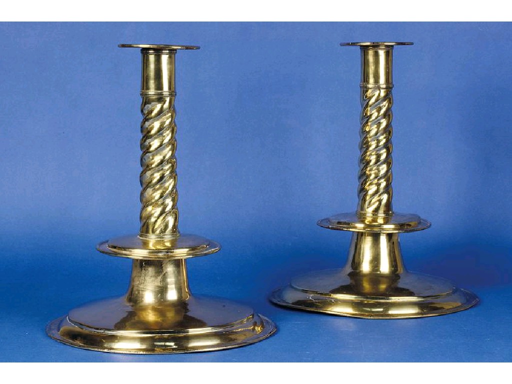 Appraisal: AN IMPORTANT PAIR OF ANGLO-DUTCH BRASS CANDLESTICKS on a monumental