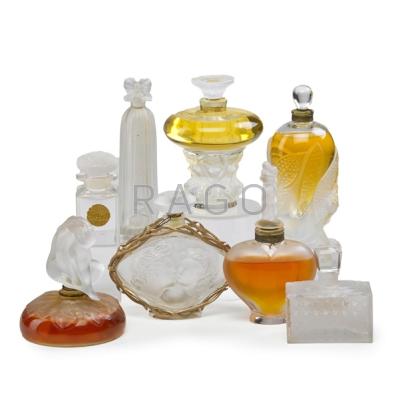 Appraisal: LALIQUE PERFUME BOTTLES Eight perfume bottles in varied sizes and