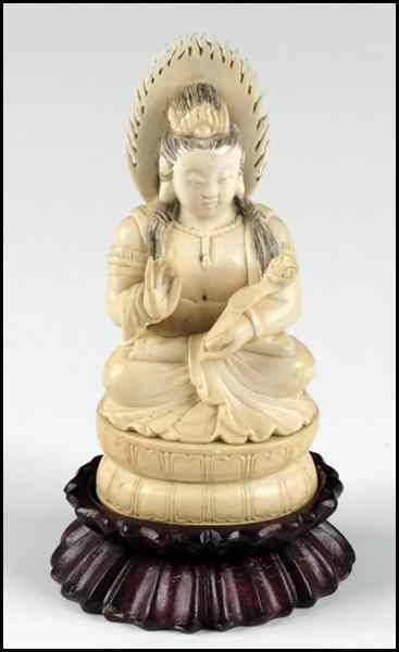 Appraisal: CHINESE CARVED IVORY FIGURE OF A SEATED BUDDHA Provenance The