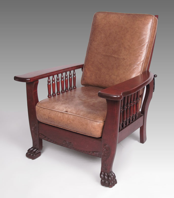 Appraisal: MORRIS TYPE RECLINING CHAIR Carved front skit and front arm