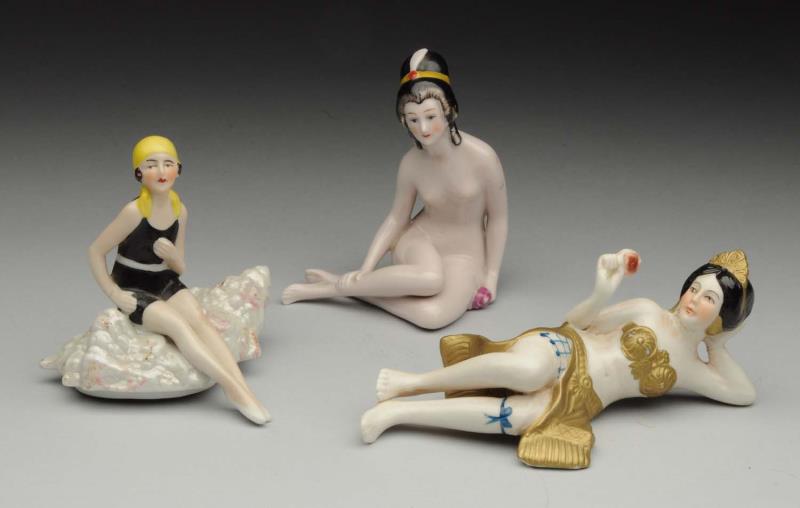 Appraisal: Lot Of Porcelain Bathing Beauty Dolls Lady sitting on a