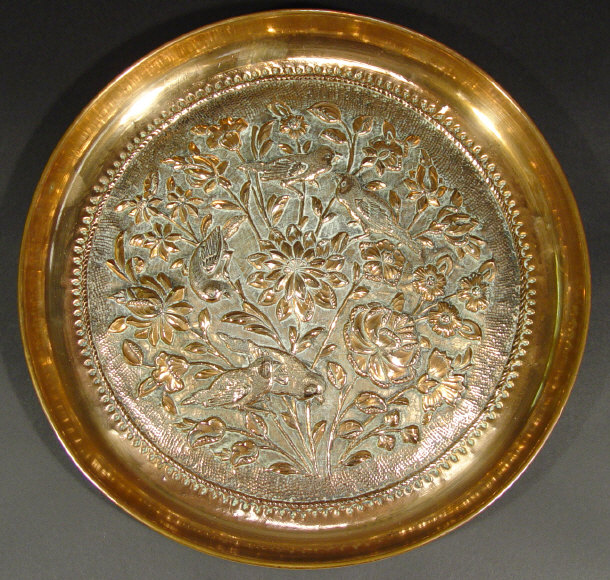 Appraisal: Victorian circular copper wall plaque embossed with birds amongst flowers