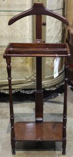 Appraisal: Mahogany silent valet rising on turned legs h Provenance From