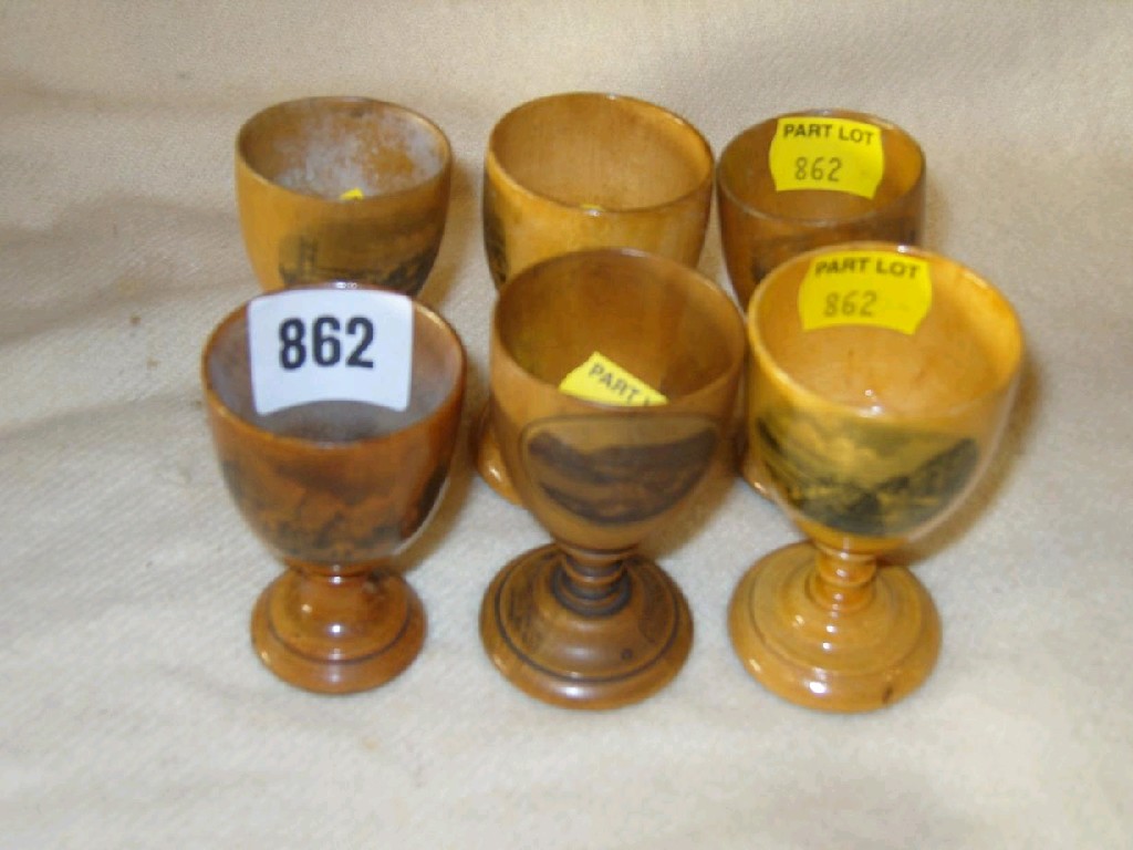 Appraisal: A collection of six Mauchline ware egg cups comprising The