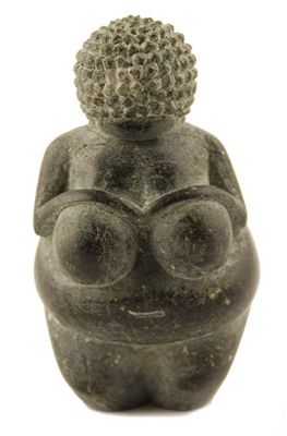 Appraisal: An Inuit carved stone figure a nude lady in cm