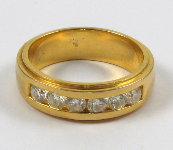 Appraisal: MAN'S DIAMOND AND FOURTEEN KARAT GOLD RING set with six