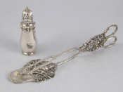 Appraisal: A small silver pepper with bayonet fitting London together with