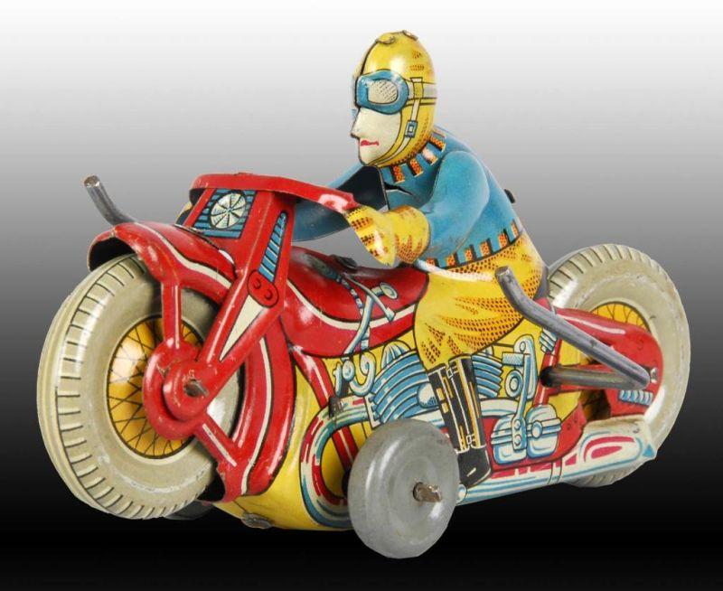 Appraisal: Japanese Tin Wind-Up Rollover Motorcycle Description Working Marked Japan on