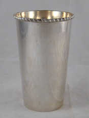 Appraisal: An grade silver tapering cylindrical vase with gadrooned rim ht