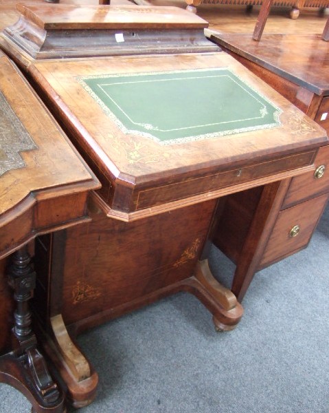 Appraisal: A Victorian style inlaid walnut Davenport with lift top compartment