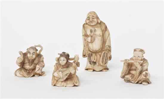 Appraisal: A Set of Four Carved Ivory Figures depicting a happy