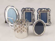 Appraisal: Sterling silver two oval photo frames one with beaded rim