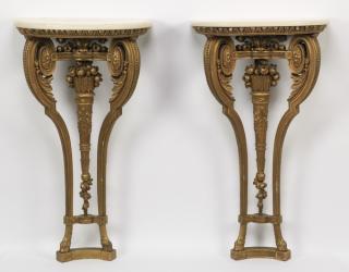 Appraisal: Marble top gilt wood wall consoles h Pair of Empire