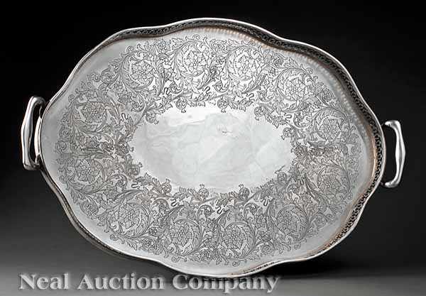 Appraisal: A Silverplate Gallery Tray of serpentine form with molded handles