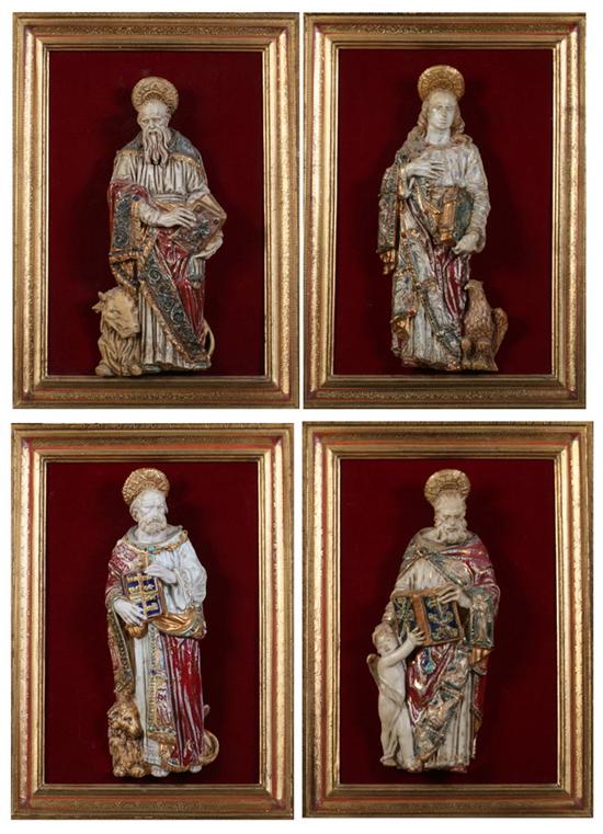 Appraisal: FOUR POLYCHROME-GLAZED TERRACOTTA FIGURES OF SAINTS BY PROF EUGENIO PATTARINO